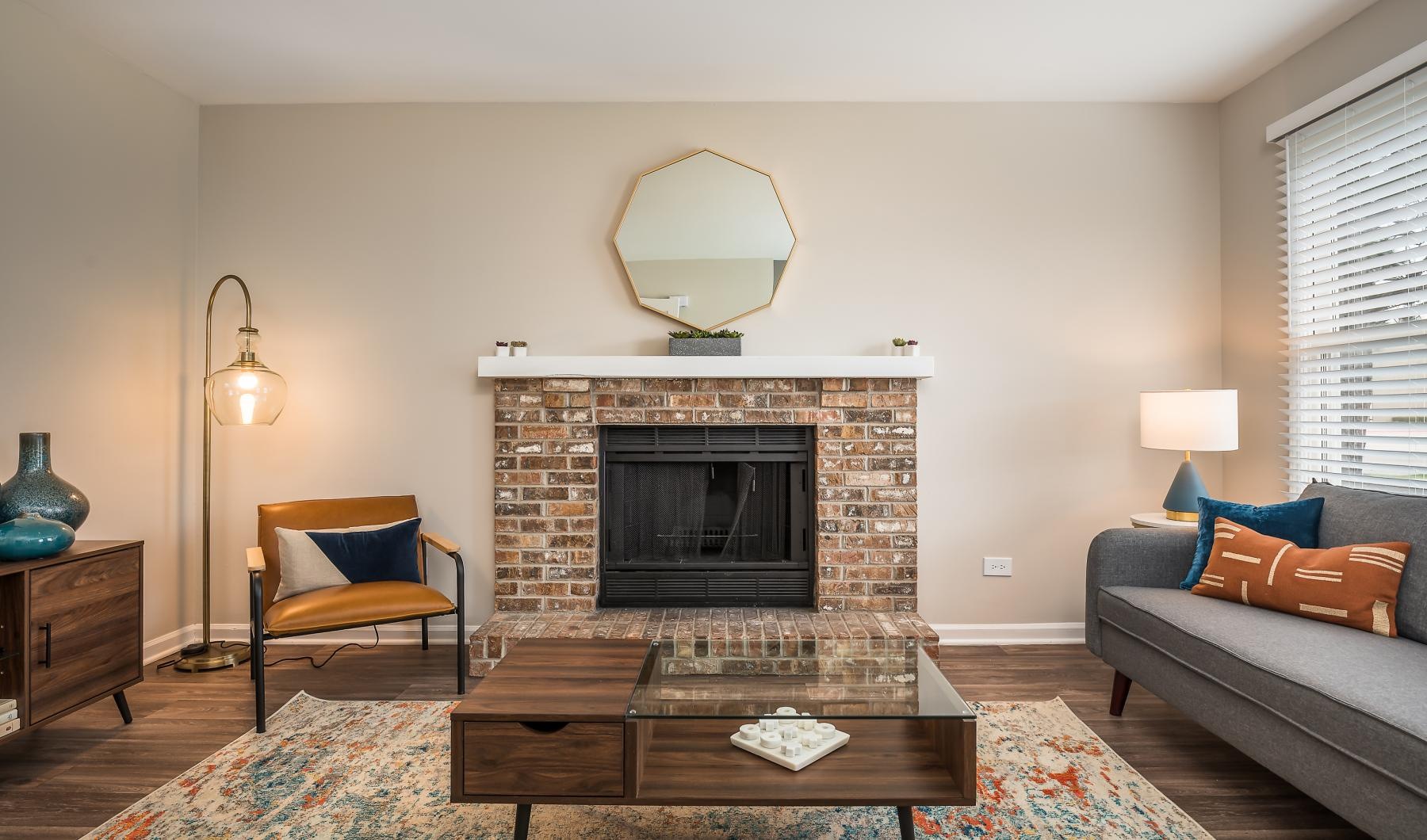 a living room with a fireplace